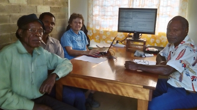 Checking the translated Scripture.